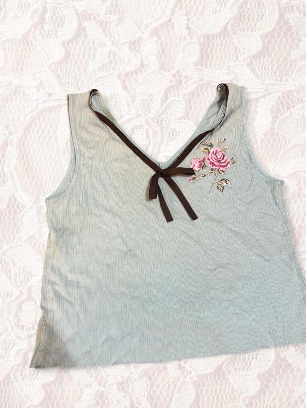 Light blue cotton tank top with pink rose embroidery and brown ribbon detail